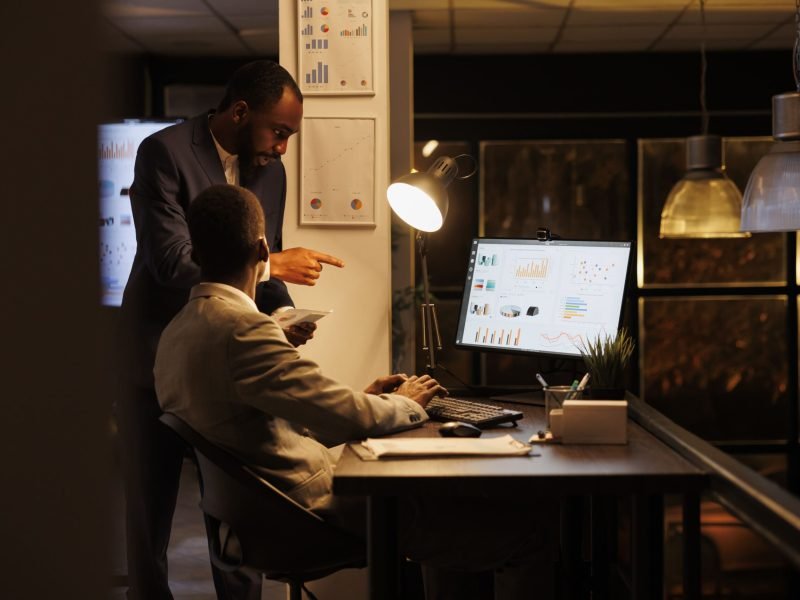 executive-managers-analyzing-financial-statistics-discussing-investment-strategy-while-working-overhours-startup-office-businessmen-planning-brainstorming-management-ideas-business-concept (2)